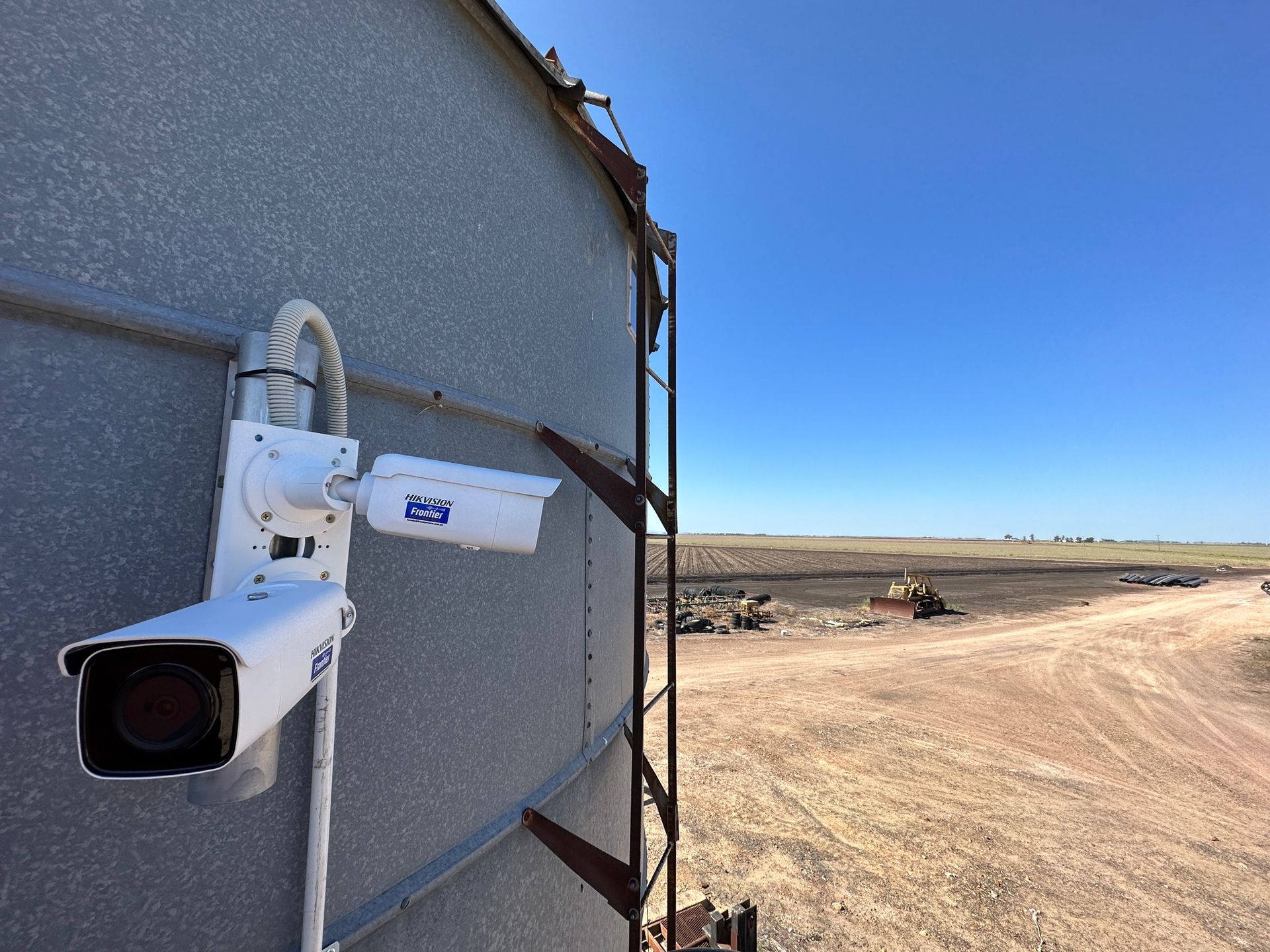 Security cameras mounted on a farm silo in the Warwick district